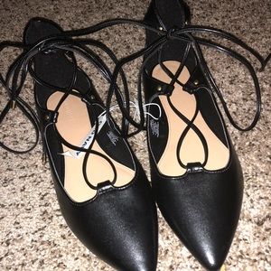 Black leather lace up flats